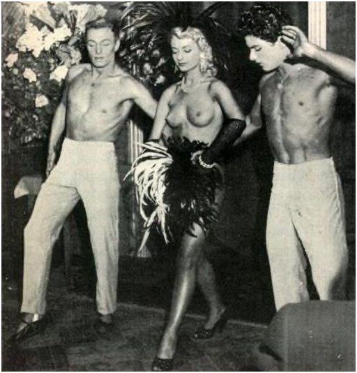 topless dancer with two male escorts