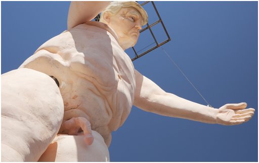 statue of a fat and naked Donald Trump